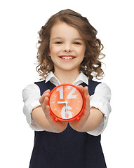 Image showing girl with alarm clock