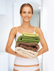 Image showing lovely woman with towels