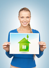 Image showing woman with illustration of green eco house