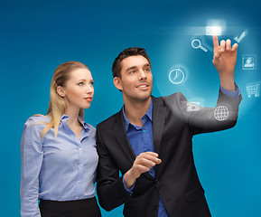 Image showing man and woman working with virtual screen