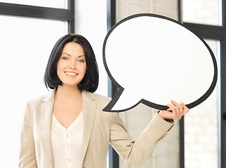 Image showing smiling businesswoman with blank text bubble