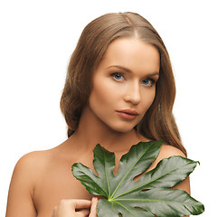 Image showing woman with green leaf