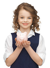 Image showing girl with piggy bank