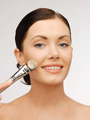 Image showing beautiful woman with brush