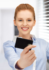 Image showing happy woman with credit card