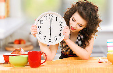 Image showing young attractive woman in the kitchen