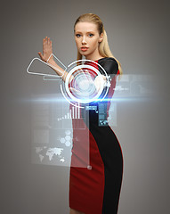 Image showing woman working with virtual touchscreens