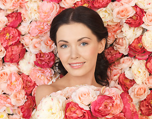 Image showing woman with background full of roses