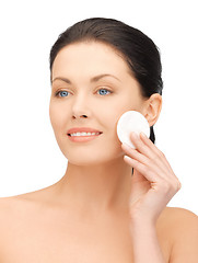 Image showing beautiful woman with cotton pad