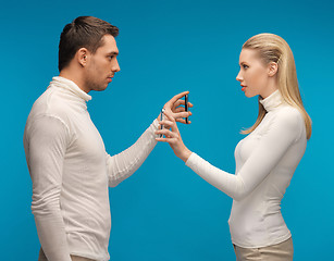 Image showing man and woman with modern gadgets