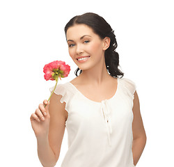 Image showing young and beautiful woman with flower