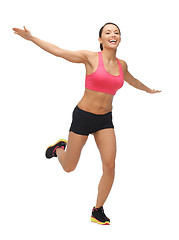 Image showing beautiful sporty woman doing exercise