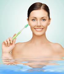 Image showing woman with toothbrush