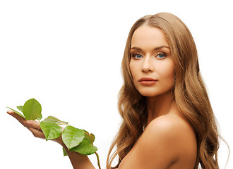 Image showing woman with green leaf