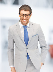 Image showing happy businessman in spectacles