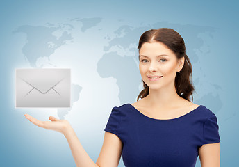 Image showing woman showing virtual envelope