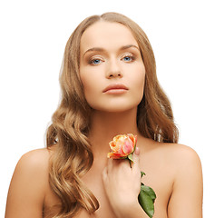 Image showing lovely woman with rose flower