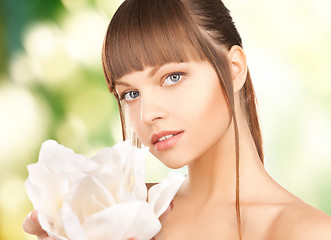 Image showing beautiful woman with orchid flower