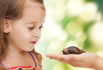 Image showing litle girl with snail