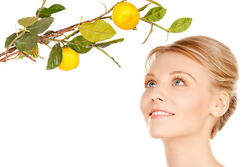 Image showing woman with lemon twig