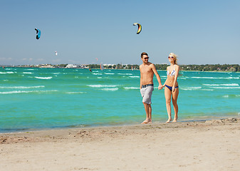 Image showing couple walking on the beach