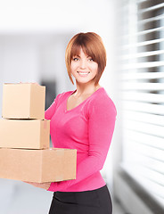 Image showing businesswoman with parcels