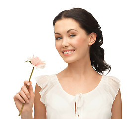 Image showing young and beautiful woman with flower