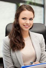 Image showing happy woman with documents