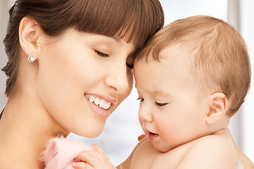 Image showing happy mother with adorable baby