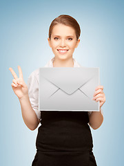 Image showing woman showing virtual envelope