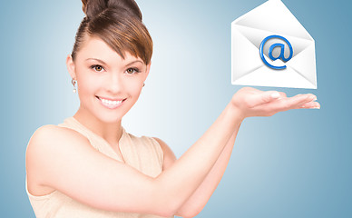 Image showing woman showing virtual envelope