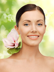 Image showing lovely woman with lily flower and butterflies