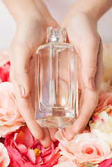 Image showing woman's hands showing perfume