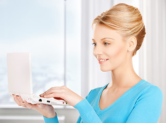 Image showing woman with laptop computer