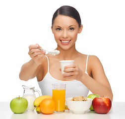 Image showing woman with fruits and yogurt