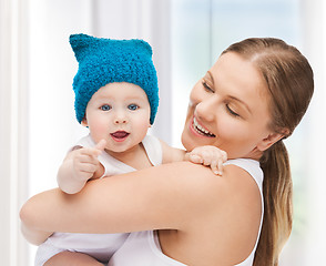 Image showing happy mother with adorable baby