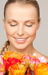 Image showing woman with red flowers