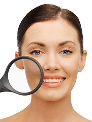 Image showing woman with magnifying glass