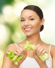 Image showing woman with fresh celery