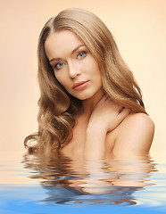 Image showing beautiful woman with long hair in water