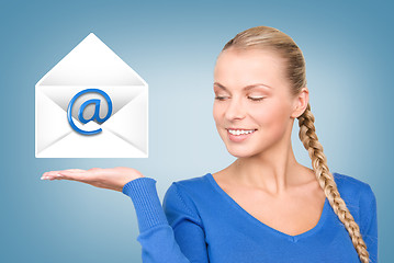 Image showing woman showing virtual envelope