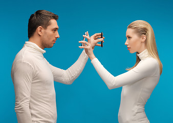 Image showing man and woman with modern gadgets