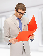 Image showing man with folders