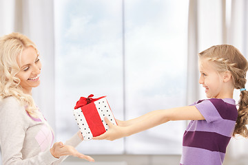 Image showing mother and little girl with gifts