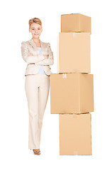 Image showing businesswoman with big boxes
