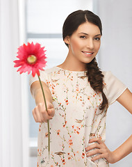 Image showing young and beautiful woman with flower