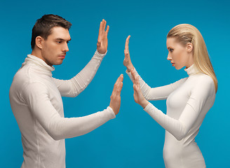 Image showing man and woman working with something imaginary