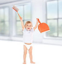 Image showing baby boy with with dustpan and brush