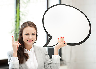 Image showing smiling businesswoman with blank text bubble