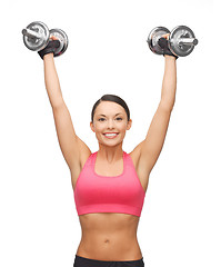 Image showing woman with heavy steel dumbbells